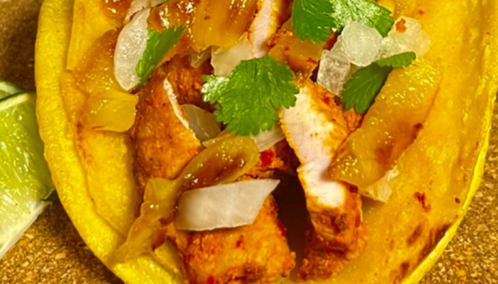 Al Pastor Taco · Marinated pork, Onions, Cilantro, grilled Pineapple