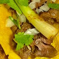 Asada Taco · Marinated Beef, Onions, Cilantro