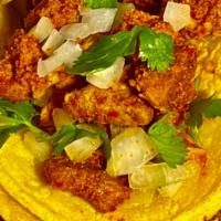 Longaniza Taco · Seasoned pork with fresh herbs, Onions, Cilantro