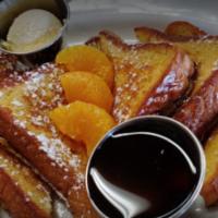 Traditional Cinnamon French Toast · 3 slices of Texas toast dipped in our homemade French toast batter, cooked to perfection, to...