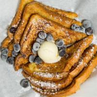 Kids French Toast · 2 slices of Texas toast dipped in our homemade French toast batter and cooked to perfection....