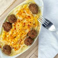 Baked Fettuccine With Meatballs (Standard) · Fettuccine noodles in creamy alfredo baked with mozzarella and parmesan cheese. Served with ...