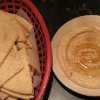 Hummus & Pita · Chickpeas mixed with tahini, lemon and spices.