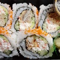 Spider Roll · Tempura softshell crab, crab salad, cucumber, avocado, radish sprout, orange caviar.