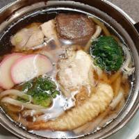 Nabeyaki Udon · Soup wheat noodle, a Tempura Shrimp, Chicken, Egg, Shiitake mushroom, Kamaboko, Green onion