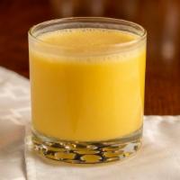 Small Mango Lassi Dring · Mango ,used plain whole milk yogurt, sweet like sugar, cardamom power and  garnish with nuts...