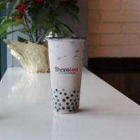 Taro Pearl Milk Tea · Hot available. This drink comes with Pearls included. Any toppings selection will be added t...