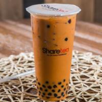 Thai Pearl Milk Tea · Hot available. This drink comes with Pearls included. Any toppings selection will be added t...