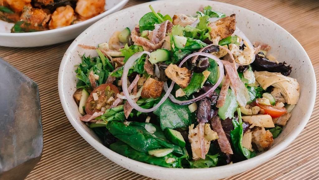 Misti Salad · Mixed greens, salami, fontina, cucumber, red onion, tomatoes, olives, artichokes, focaccia crouton, oregano vinaigrette