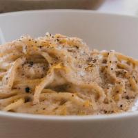 Cacio E Peppe · Spaghetti alla Chitarra, parmesan, peppercorn medley, lemon zest