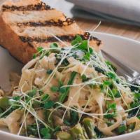 Pasta Primavera · Fettuccine, broccolini, asparagus, cartelized onion, spinach, garlic, white wine-butter