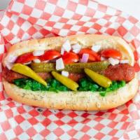 Chicago Dog · Tomato, Pickle, Hot Peppers, Onion, Relish, Poppy Seeds & Celery Salt.