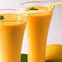 Mango Lassi · Traditional delicious yoghurt based drink
made by blending yoghurt with sugar and
mango pulp
