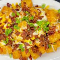Loaded Fries Or Tots · Melted cheese, bacon and green onion.