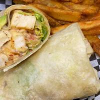 Chicken Avocado Wrap · Grilled chicken breast, avocado, bacon, lettuce, tomatoes, red onion, and chipotle mayo. Ser...