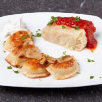 Golabki (Stuffed Cabbage Roll) With 5 Pierogies · Pork, rice and spices, wrapped in a cabbage served with tomato sauce.