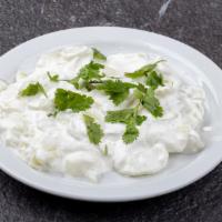 Cucumber Salad · Cucumber with sour cream and spices.
