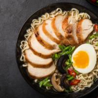 Chicken Ramen · Rich, slow cooked chicken broth with bouncy ramen noodles topped with bean sprouts, sweet co...