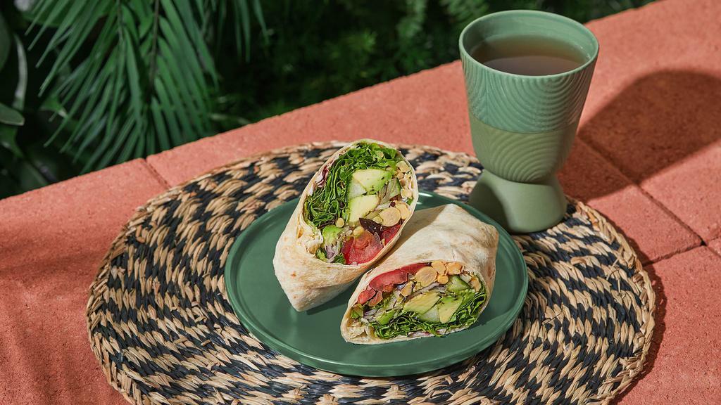 Avocado Chickpea Wrap · Chickpeas, Avocado, Mixed Greens, Tomato, Bean Sprouts, Red Onion, Cucumber.