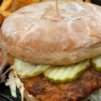 Clucker’S Original Sandwich Combo · Crispy chicken breast, bacon, cheddar, dill pickles, roasted garlic mayo. Served with a side...