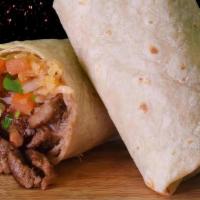 Carne Asada Burrito · also includes Guacamole, and pico de gallo inside