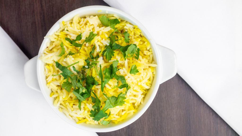 Basmati Rice · Basmati rice is filled with aromatic herbs like fresh basil, fresh thyme, and green onions.