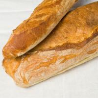 Slice Of Artisan Bread · 9Grain, Sourdough, Italian, Euro Rye, Apricot Walnut, Cranberry Orange, Honey Wheat, Chili C...