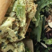 Curry Chicken Salad Sandwich · Shredded chicken breast, pineapple, golden raisins, almonds, celery and curry mayo with baby...