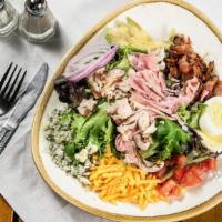 Chef Salad · Turkey breast, ham, bacon, tomato, red onion, cheddar, blue cheese, avocado and a hard-boile...