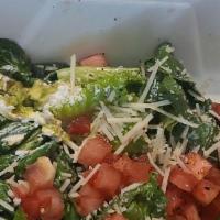Caesar Salad · Romaine lettuce tossed in our house-made Caesar dressing, tomato, red onion, house-made cros...