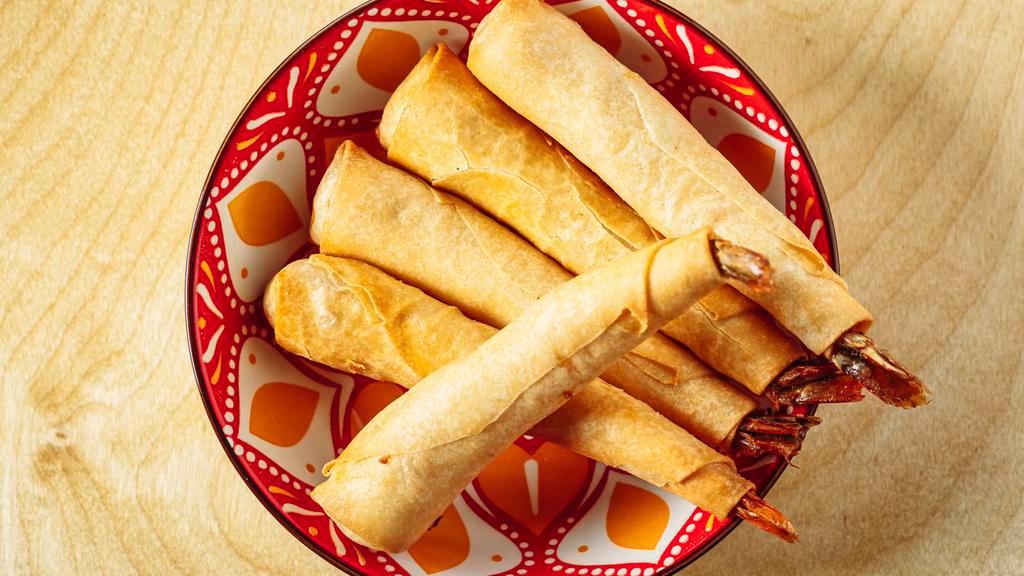 Sleeping Prawn · Deep Fried Shrimp wrapped in egg rolls wrapper served with sweet and sour sauce