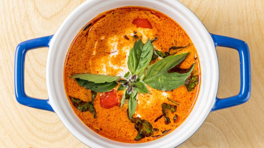 Red Curry · Hot red curry paste, bamboo shoots, red bell peppers, eggplant, green bean and basil.