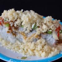 Volcano Roll (4 Pieces) · Tempura shrimp and crab salad inside topped spicy mayo, sriracha, teriyaki sauce, and tempur...