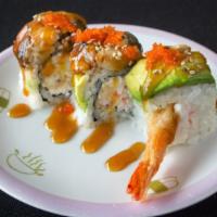 Dragon Roll (3 Pieces) · Tempura shrimp and crab salad inside. Topped with eel, avocado, masago. And teriyaki sauce.
