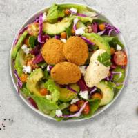 Vegan Falafel Salad · Lettuce, tomatoes, onions, peppers, pickled turnips, cucumbers, comes with olive oil, and hu...
