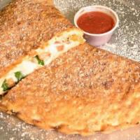 Spicy Chicken Calzone · Stuffed with grilled chicken, bacon, jalapenos, mozzarella & ricotta cheese.