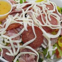 Italian Salad · Fresh garden salad topped with pepperoni, salami, ham, cheese & your choice of dressing.