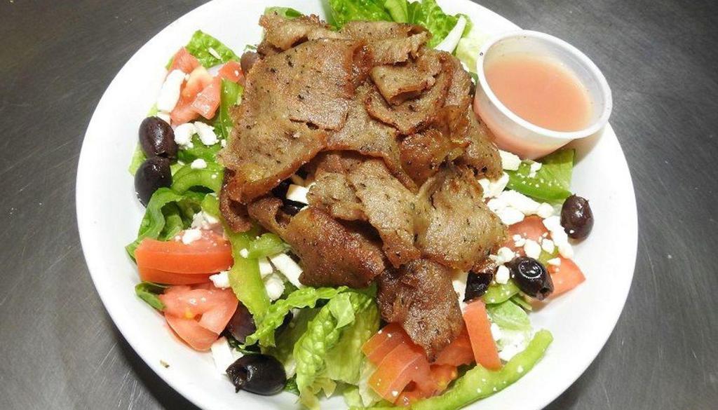 Gyro Salad · Greek salad topped with gyro meat.