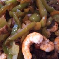 Fajitas De Camaron · Grilled shrimp with bell peppers and onions with rice and beans.