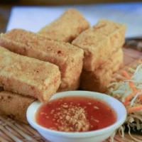 Crispy Fried Tofu · Deep-fried tofu in special batter served with peanut in sweet chili sauce.