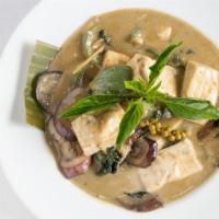 Green Curry · Classic Thai green curry with green bean, eggplant, bamboo shoot, bell pepper.