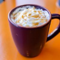 Karmel Sutra · A wonderful blend of caramel, milk topped with espresso, caramel sauce and whip
