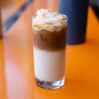 Iced Karmel Sutra · A wonderful blend of caramel, milk topped with espresso, caramel sauce and whip