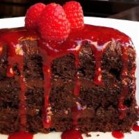 Vegan Chocolate Cake · Three layers of the ultimate house-made Ghirardelli vegan chocolate cake, served with fresh ...