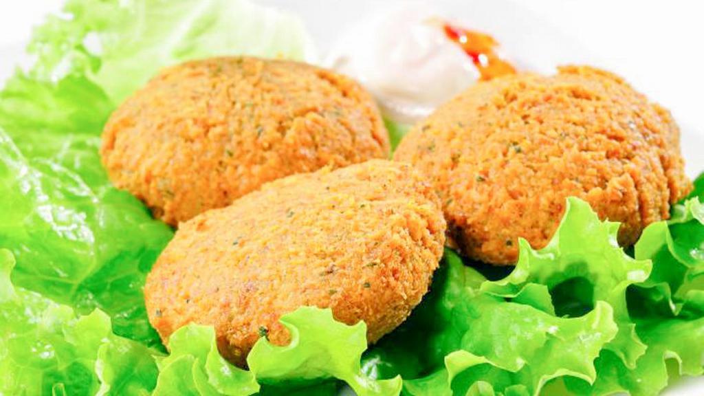 Falafel Balls · Ground chickpeas patties blended with parsley, onions, garlic, and seasonings. Deep fried to perfection served individually.