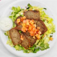 Lamb & Beef Gyro Over Salad · Seasoned grilled lamp and beef served over mixture of  lettuce, tomatoes, cucumbers mixed wi...
