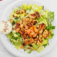 Chicken Shish Kebob Over Salad · White breast chicken with Barbecue seasoning grilled and served over mixture of Lettuce, tom...