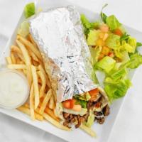 Beef Shawarma Sandwich · Marinated beef with special spices and lettuce and tomato. Topped with tahini sauce. Come wi...