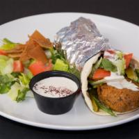 Falafel Sandwich Vegetarian · Vegetarian. Deep fried vegetable patties made with chickpeas and spices with lettuce, tomato...