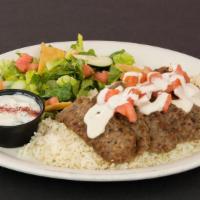 Grilled Gyro Platter · Seasoned grilled lamb and beef. Served over basmati rice with Greek salad, fattoush salad, a...